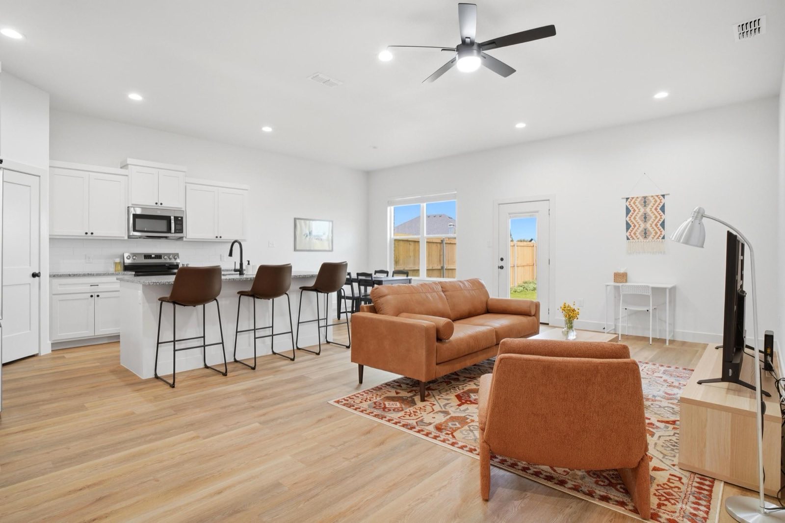 Open living room and kitchen in Wylie East Crew House 2