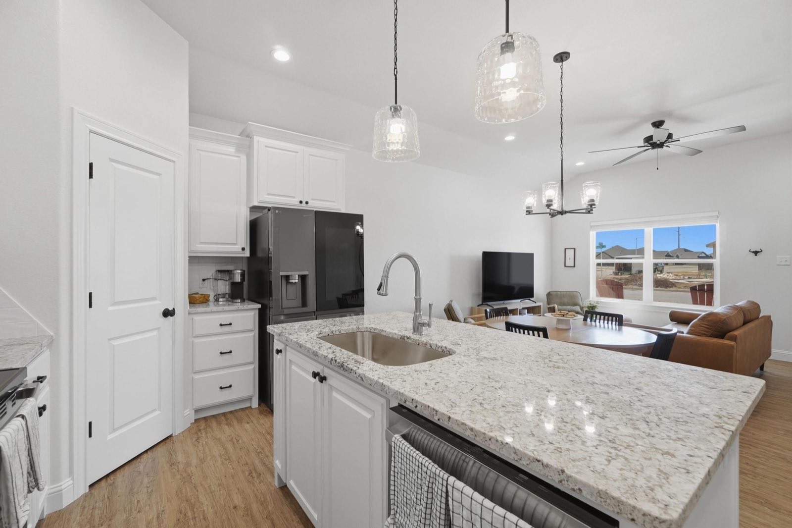 Kitchen island with granite counters in Wylie West